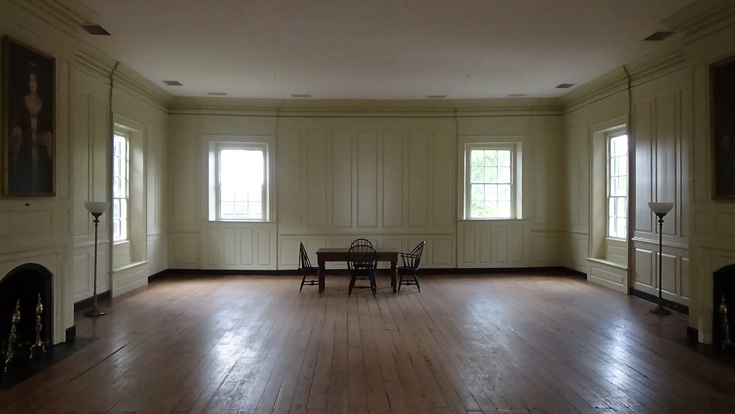 Photo of white-paneled room