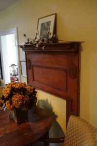 Photo of mantle mounted to a wall