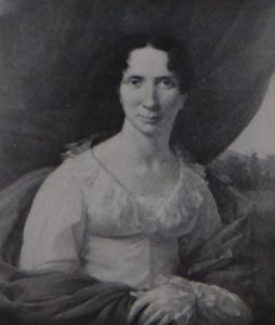 Painting of a woman with dark hair in a white dress