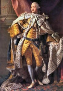 Painting of a man in a gold suit, fur cape, and powdered wig
